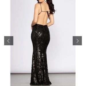 Low-back black sequin dress